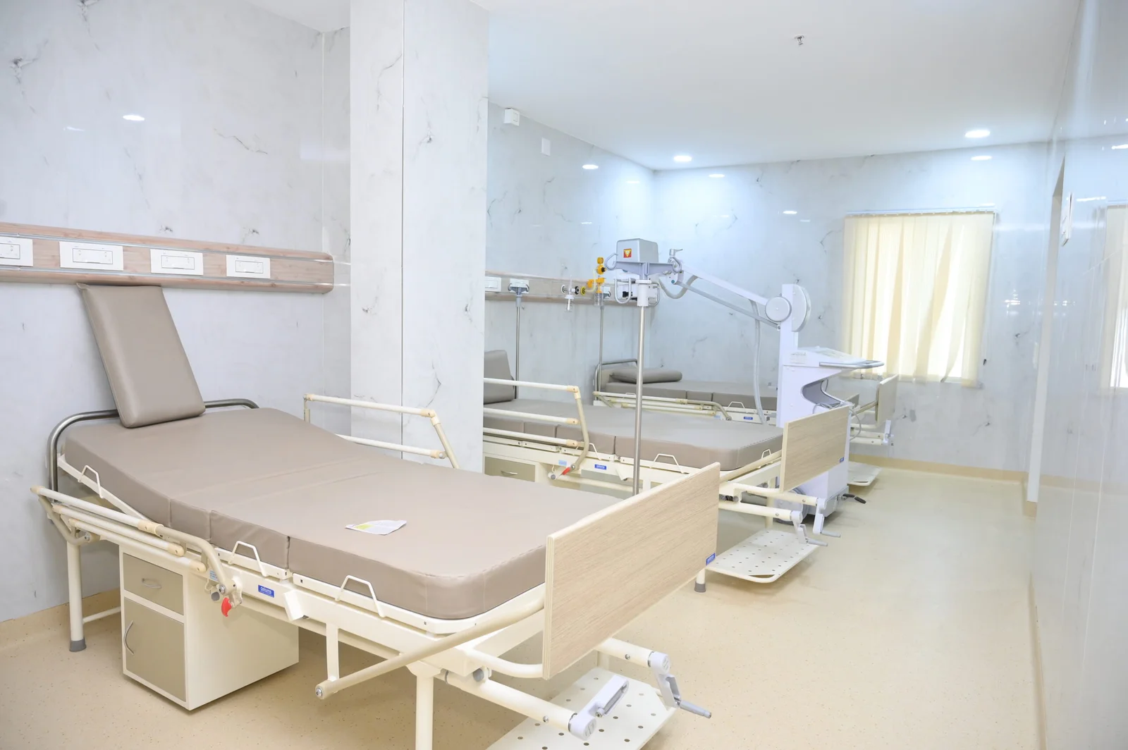 Nurses assisting patient